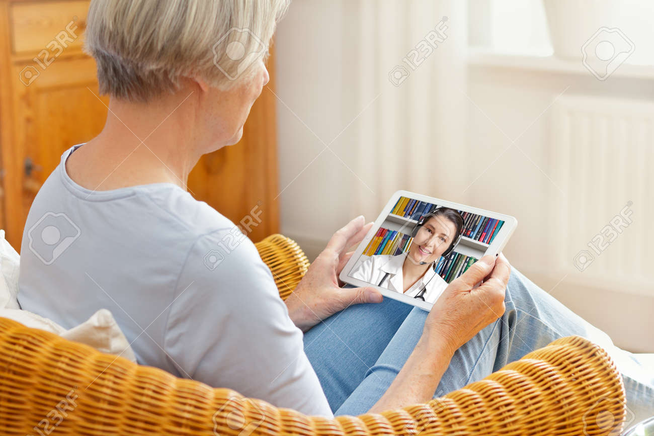 131443622-telemedicine-senior-woman-tablet-computer